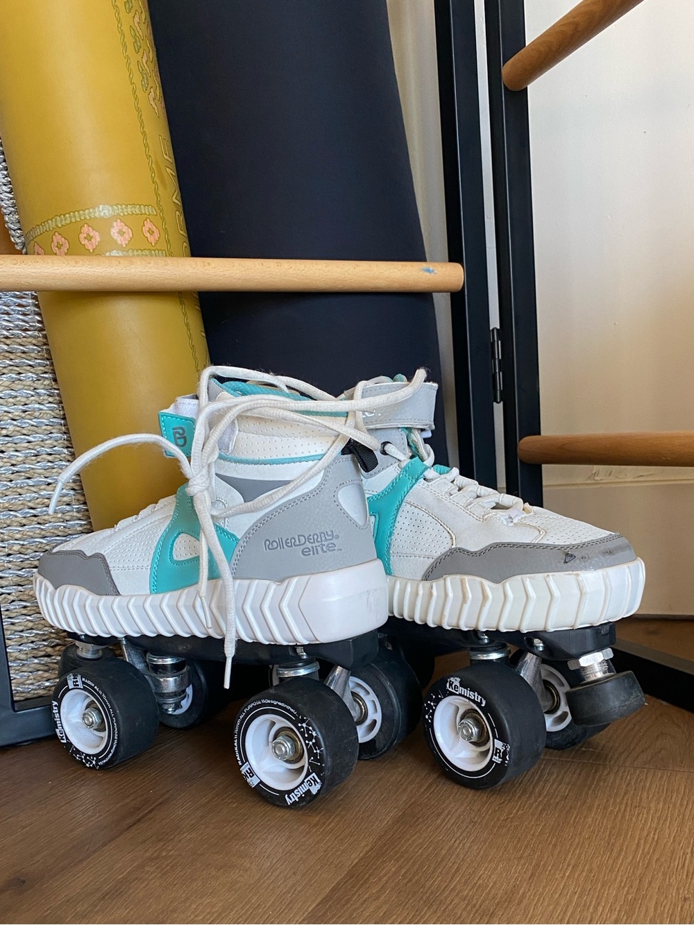 Youth High-Top Roller Skates in Teal and White
